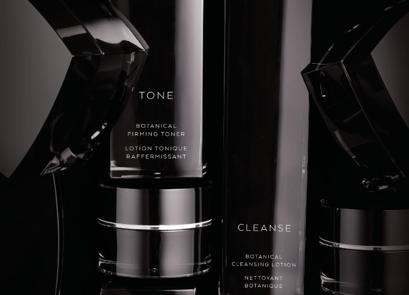 toner, cleanser, and other skincare products in black cases