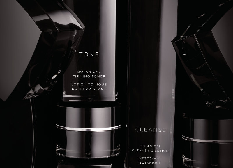 toner, cleanser, and other skincare products in black cases