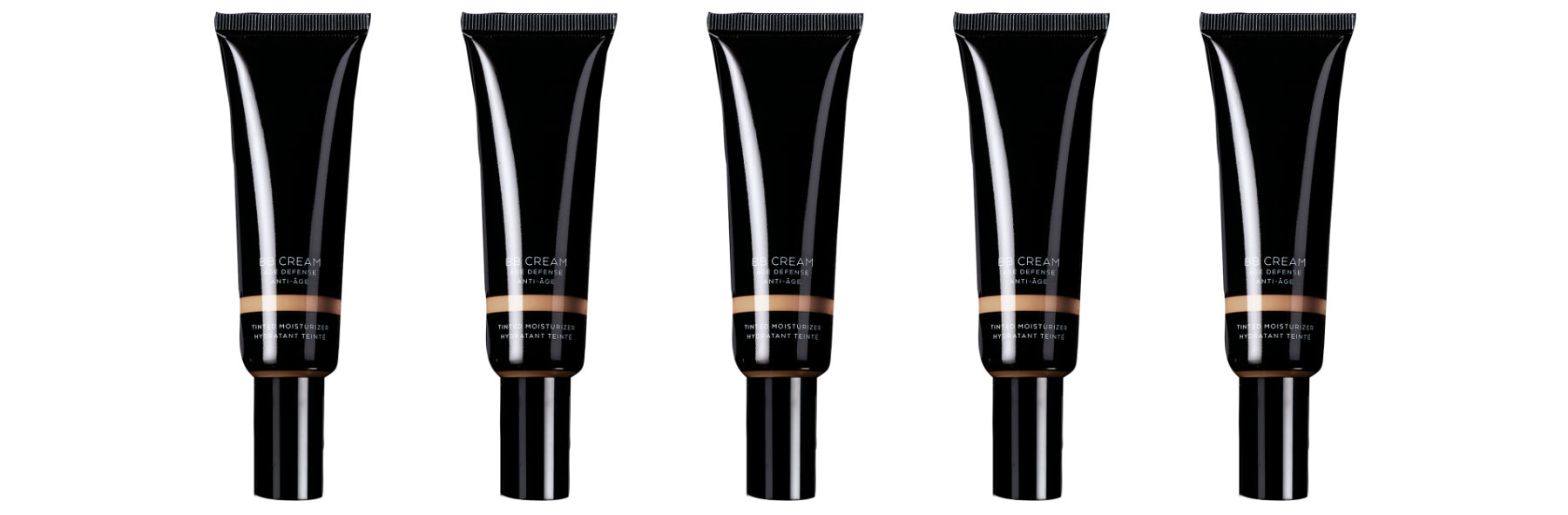 row of glossy black skin cream tubes