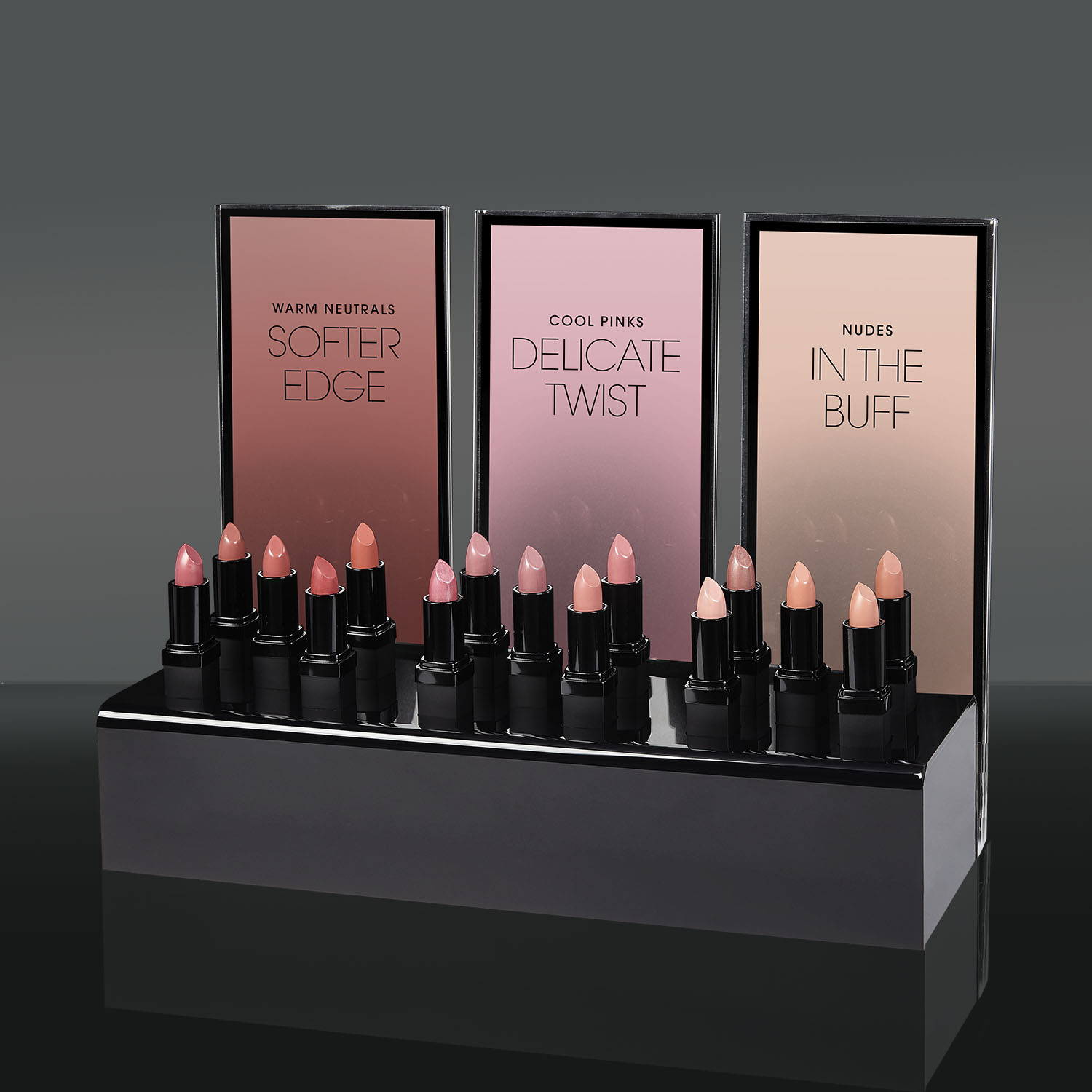 Platinum Bar, a counter top display that holds 15 lipsticks. It measures in inches 14 by 11.25 by 4